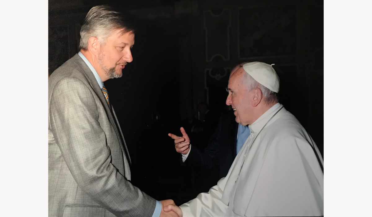 Widmer with Pope Francis