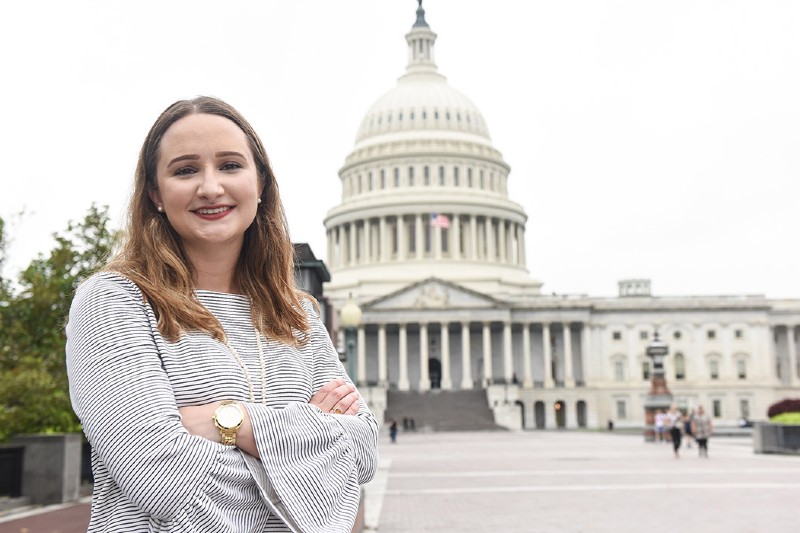 Student outside Capitol