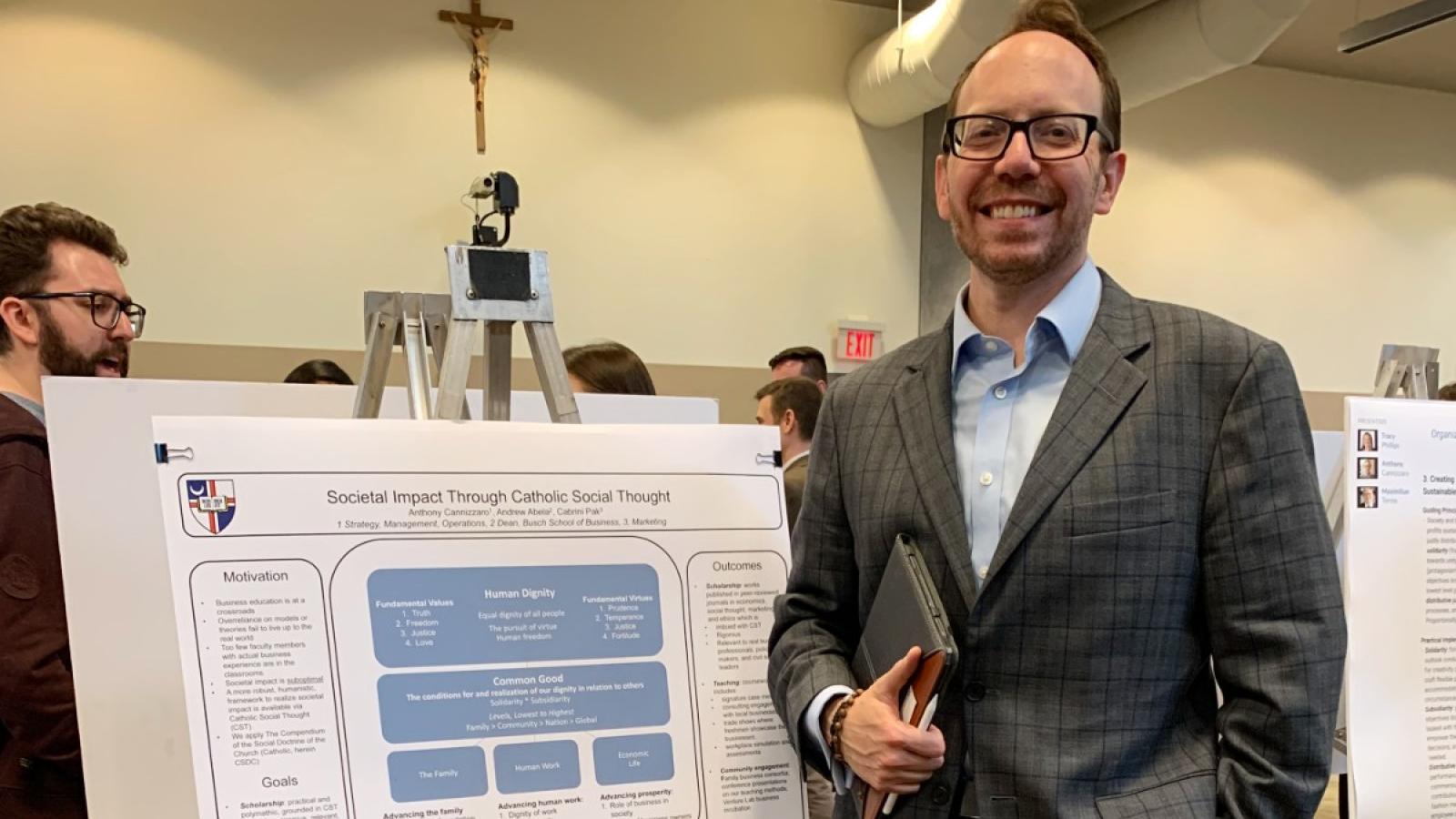 Dr. Anthony Cannizzarro in collaboration with Tracy Phillips and Dr. Maximilian Torres presented on the “Societal Impact Through Catholic Social Thought” at Catholic University’s Research Day.