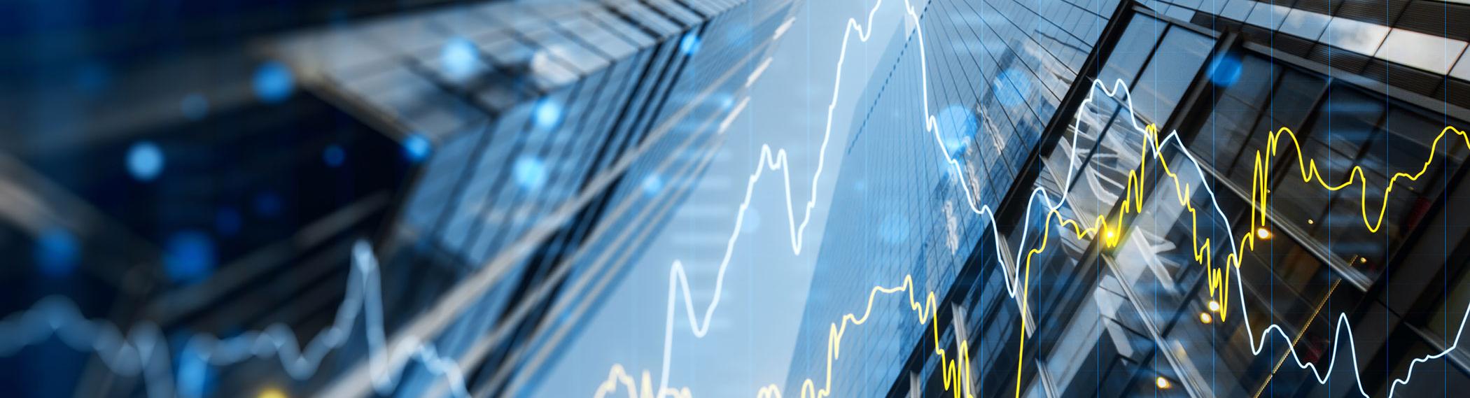 Images of skyscrapers going up with a stock market graph overlay.