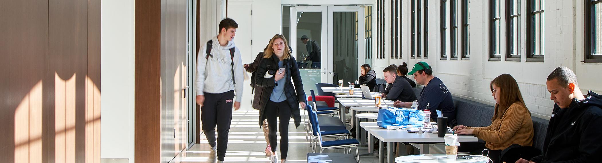 Students studying in Maloney Hallway.
