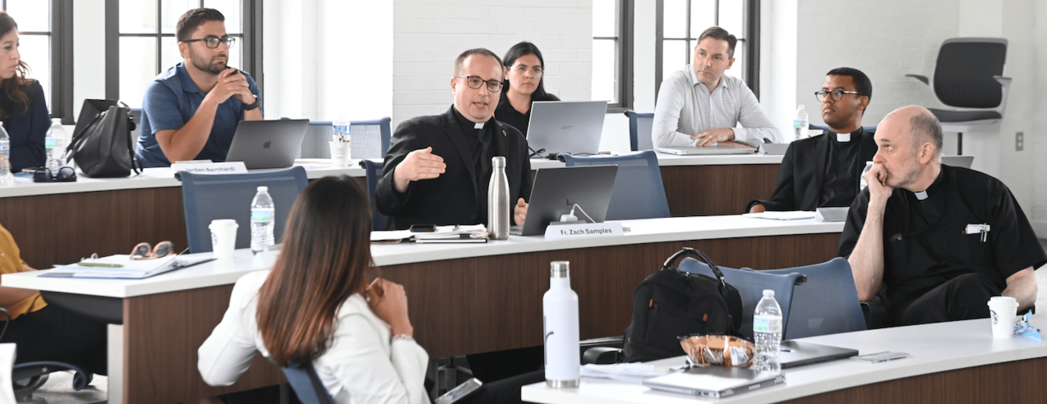 executives of the church in a class setting
