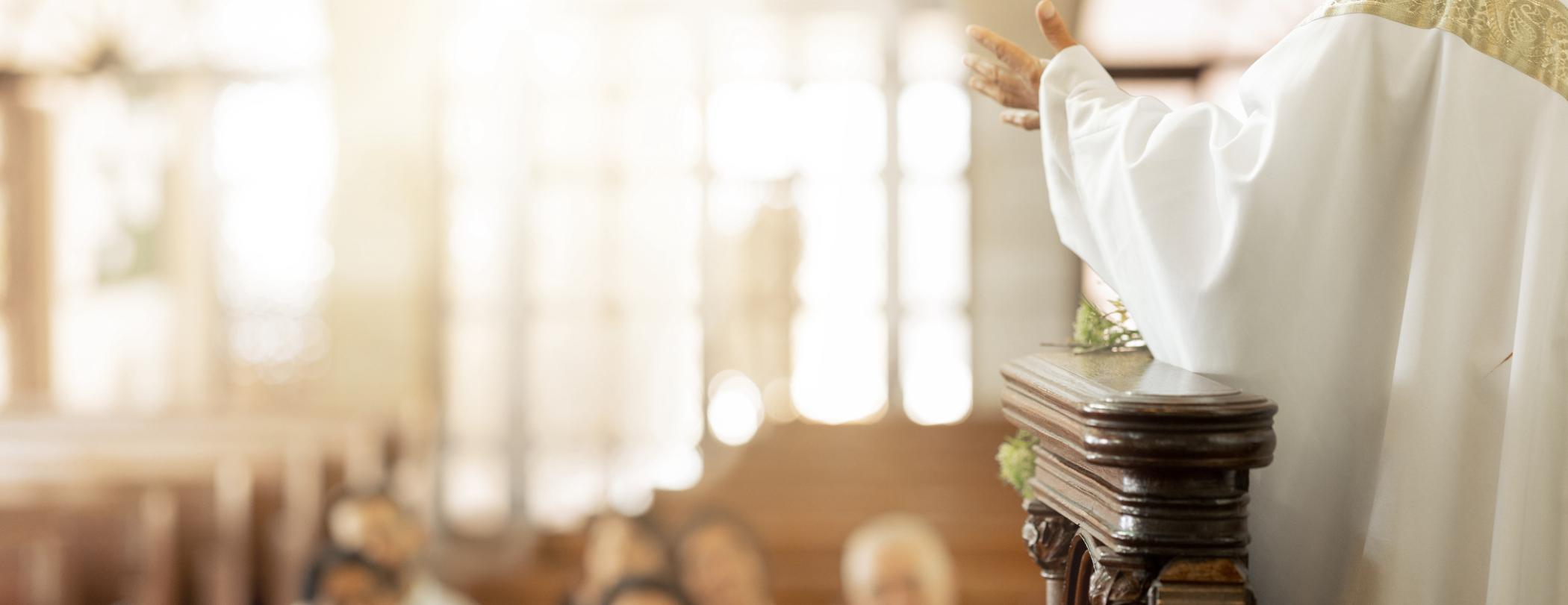 pastor leading church