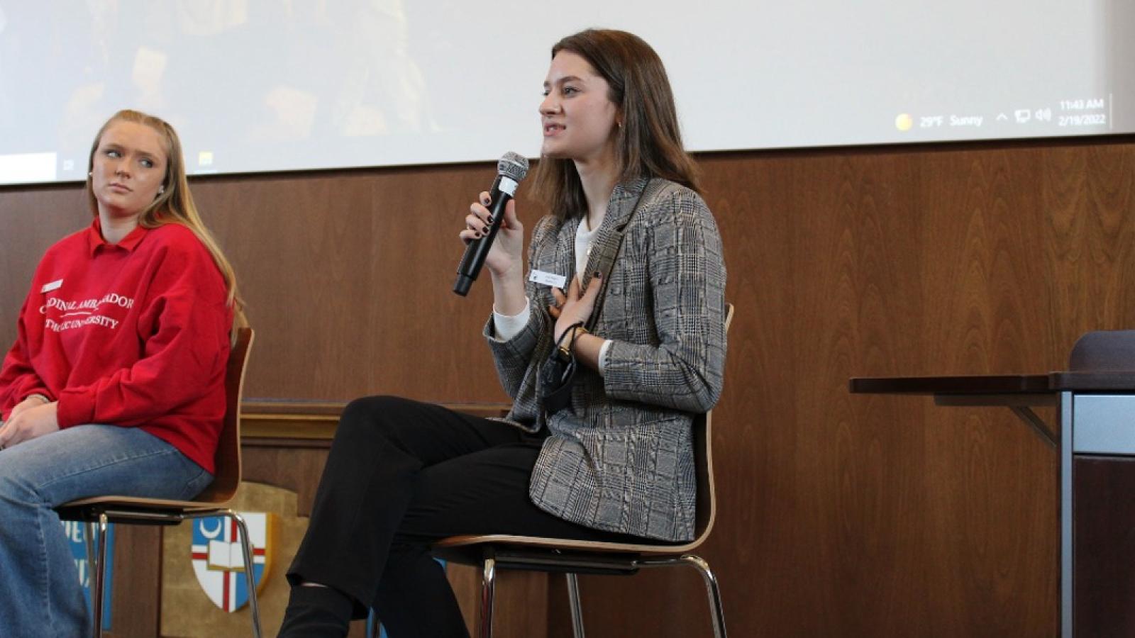 Julia speaking on a panel to prospective students