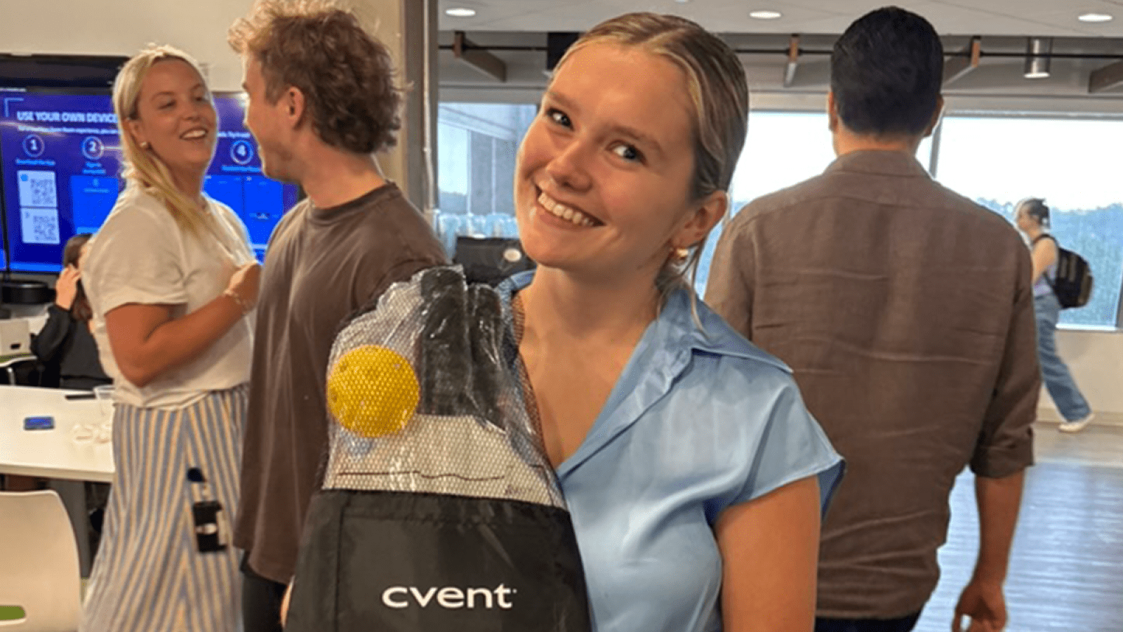 brigid with a cvent gift bag