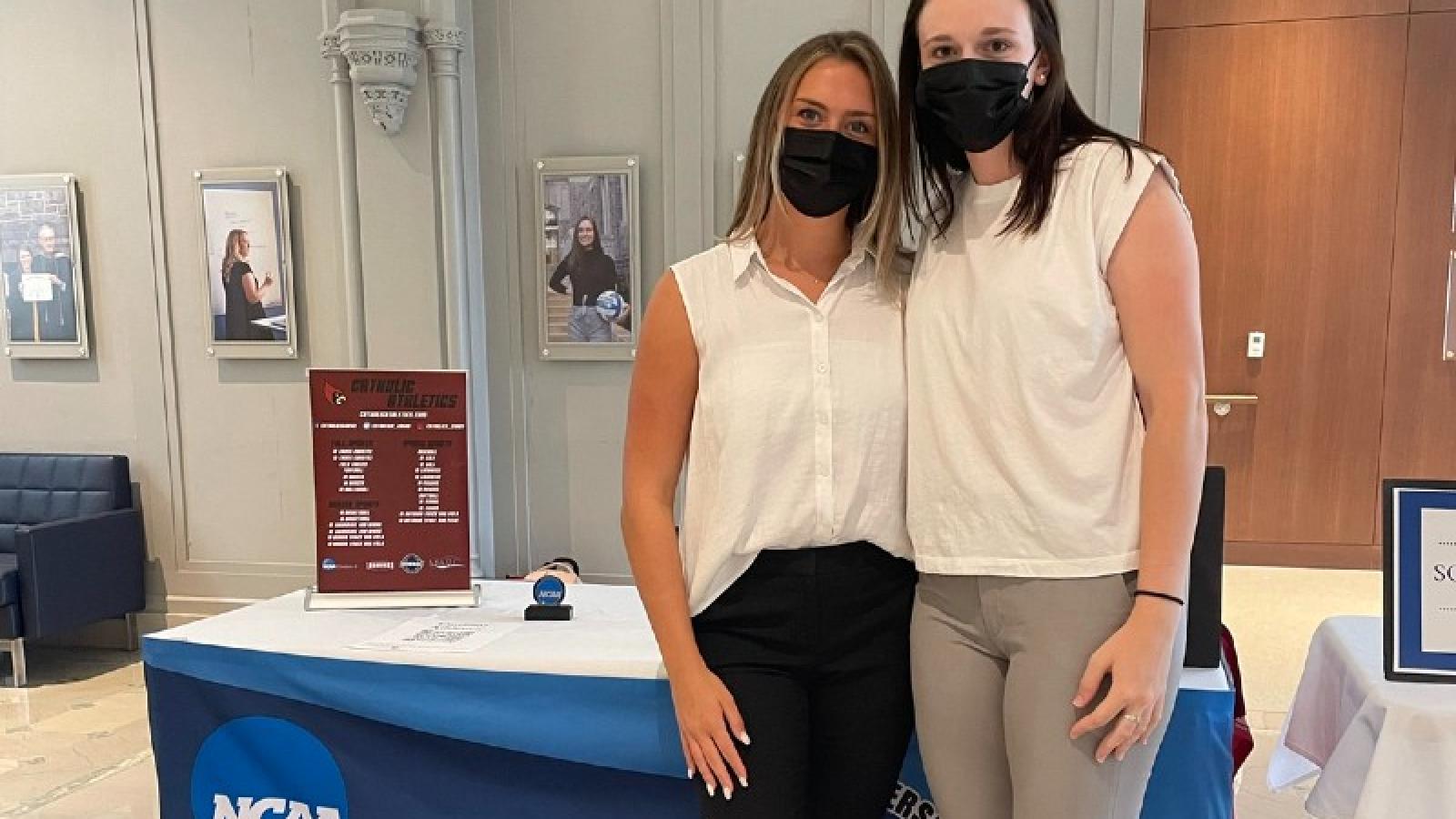 caroline with a friend in the business school