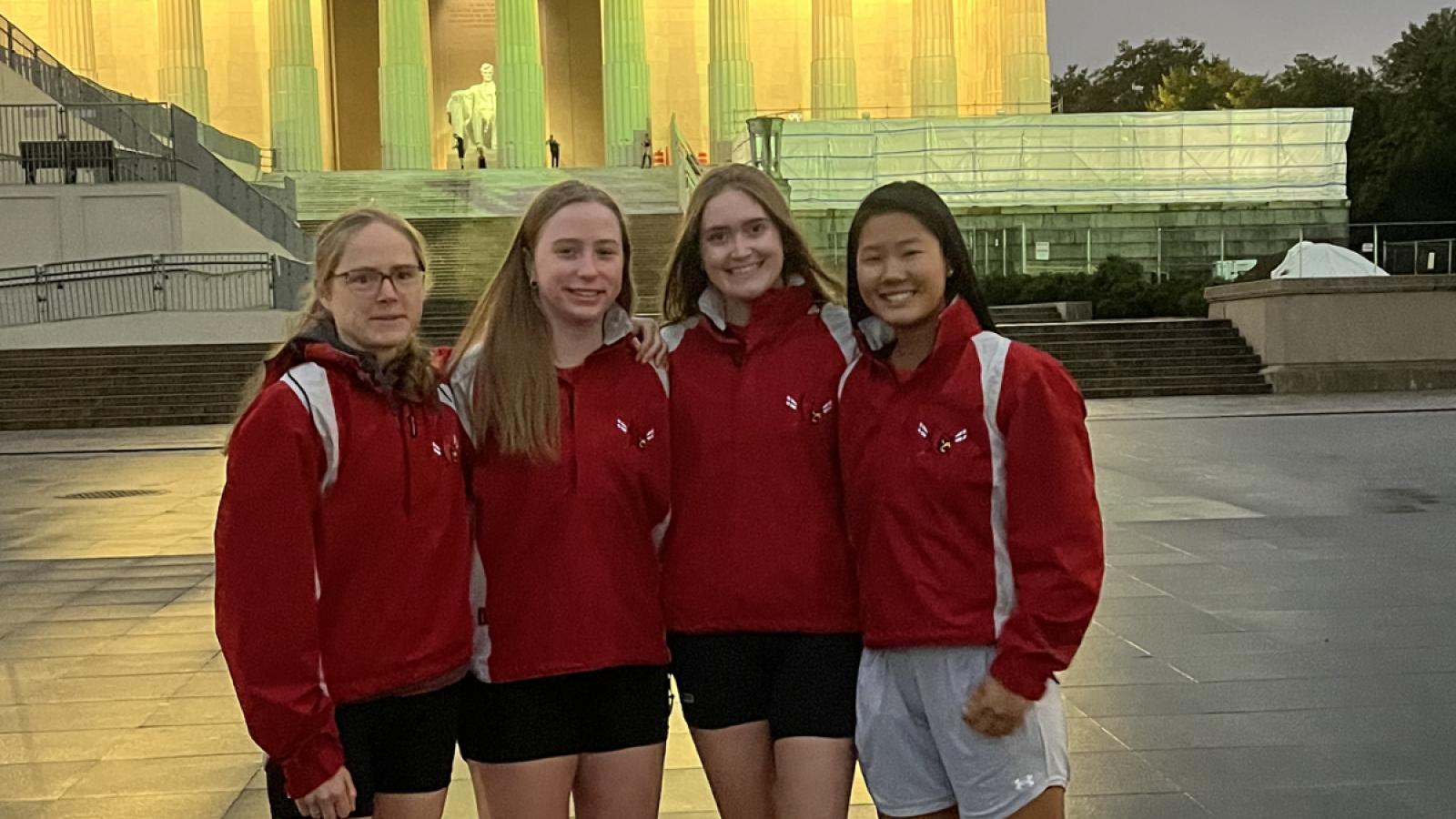 claudia and members of the CUA rowing team at the lincoln memorial