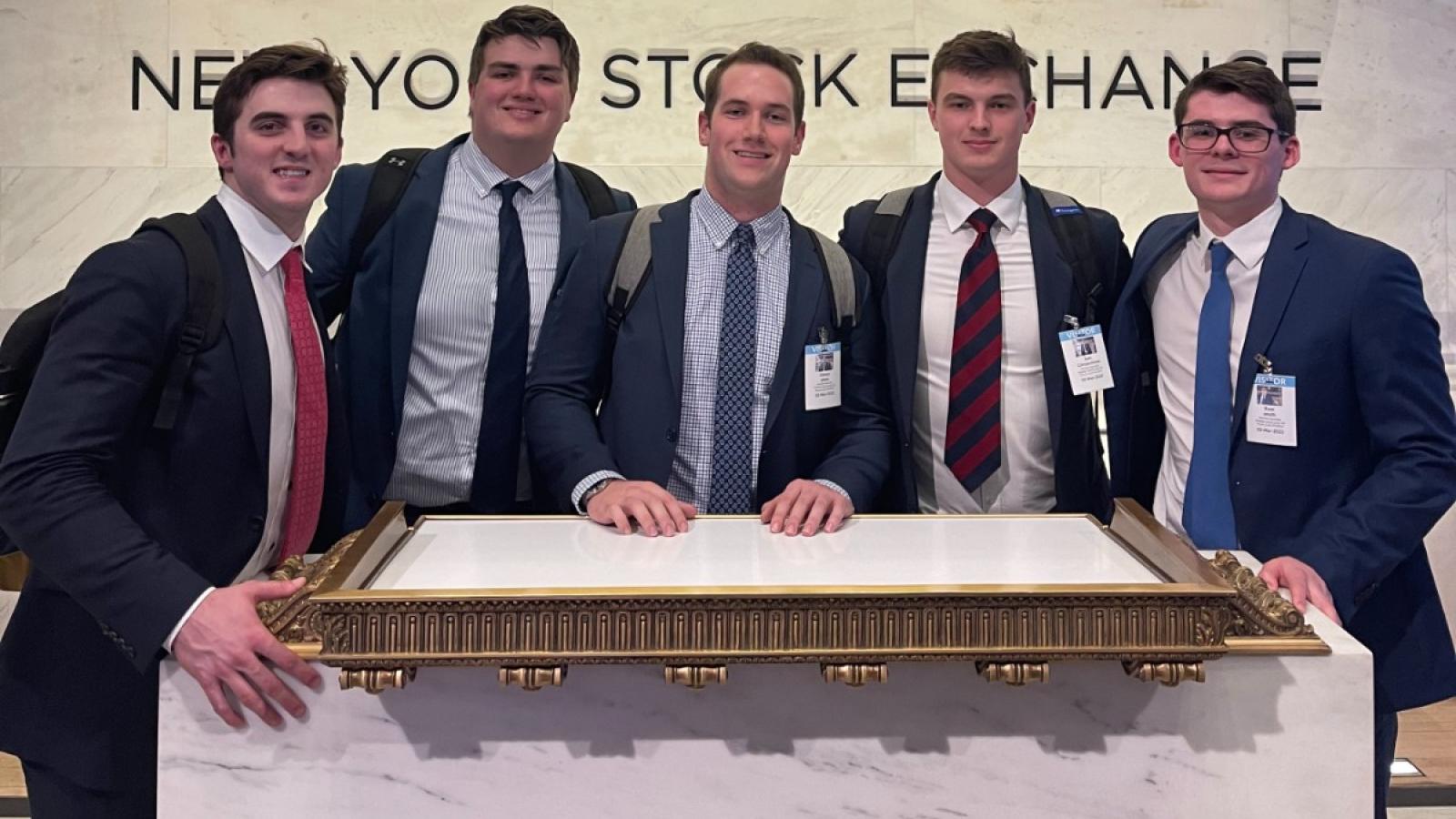 josh and bussines school friends at the new york stock exchange