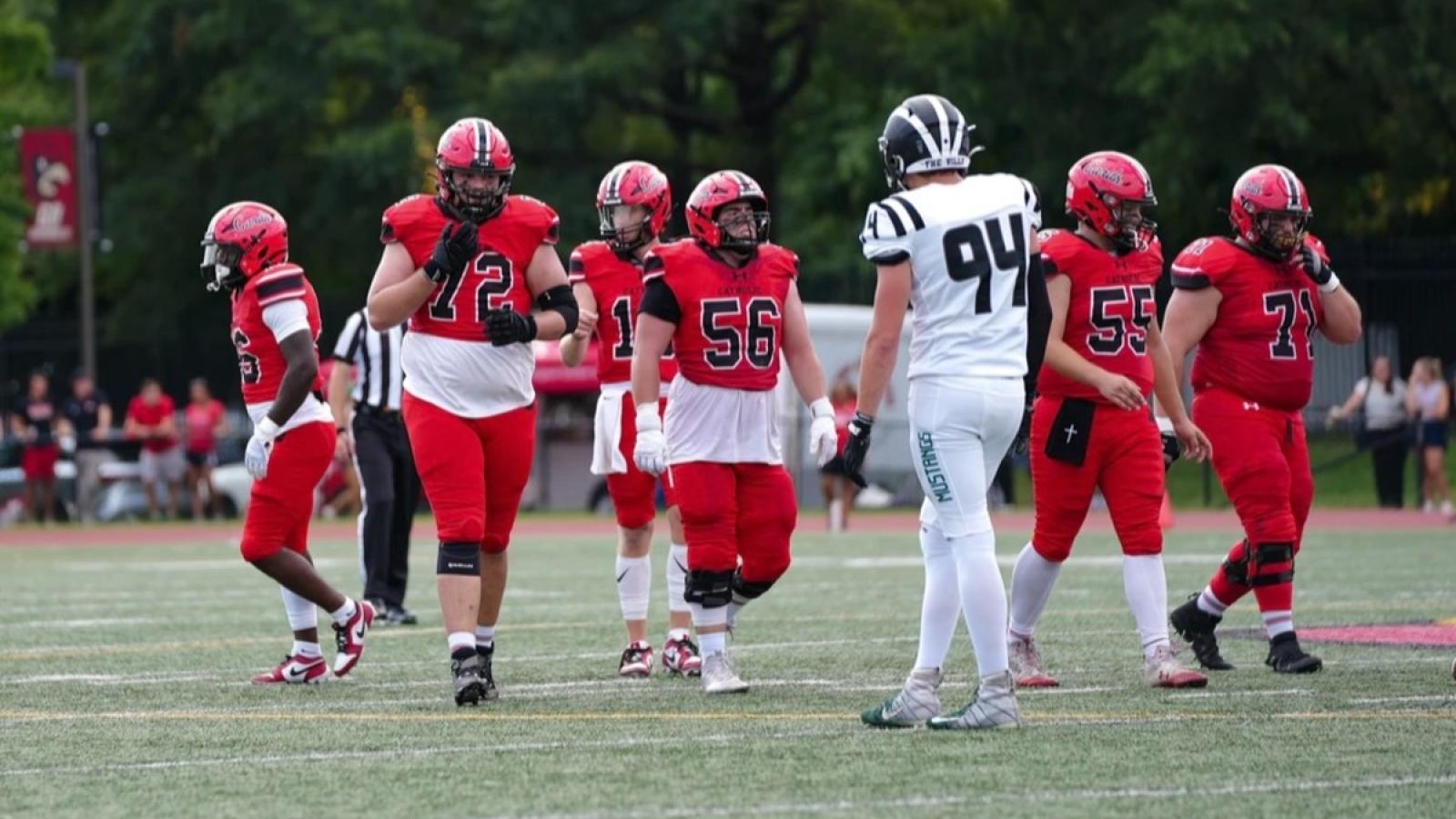 josh playing football for the CUA cardinals