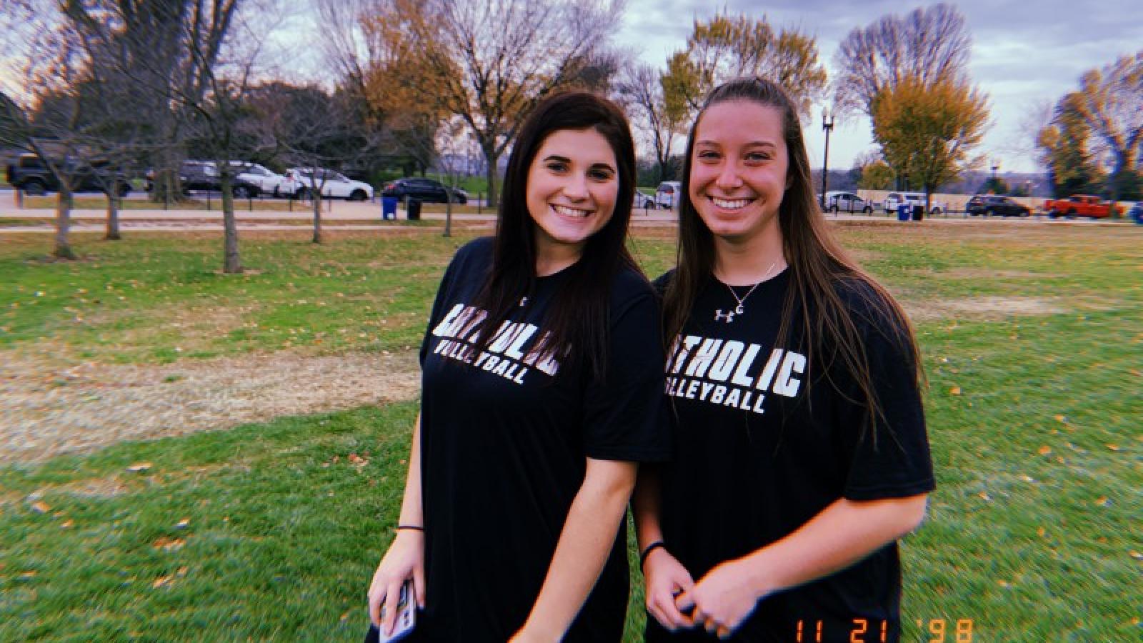 katie and a teammate outdoors