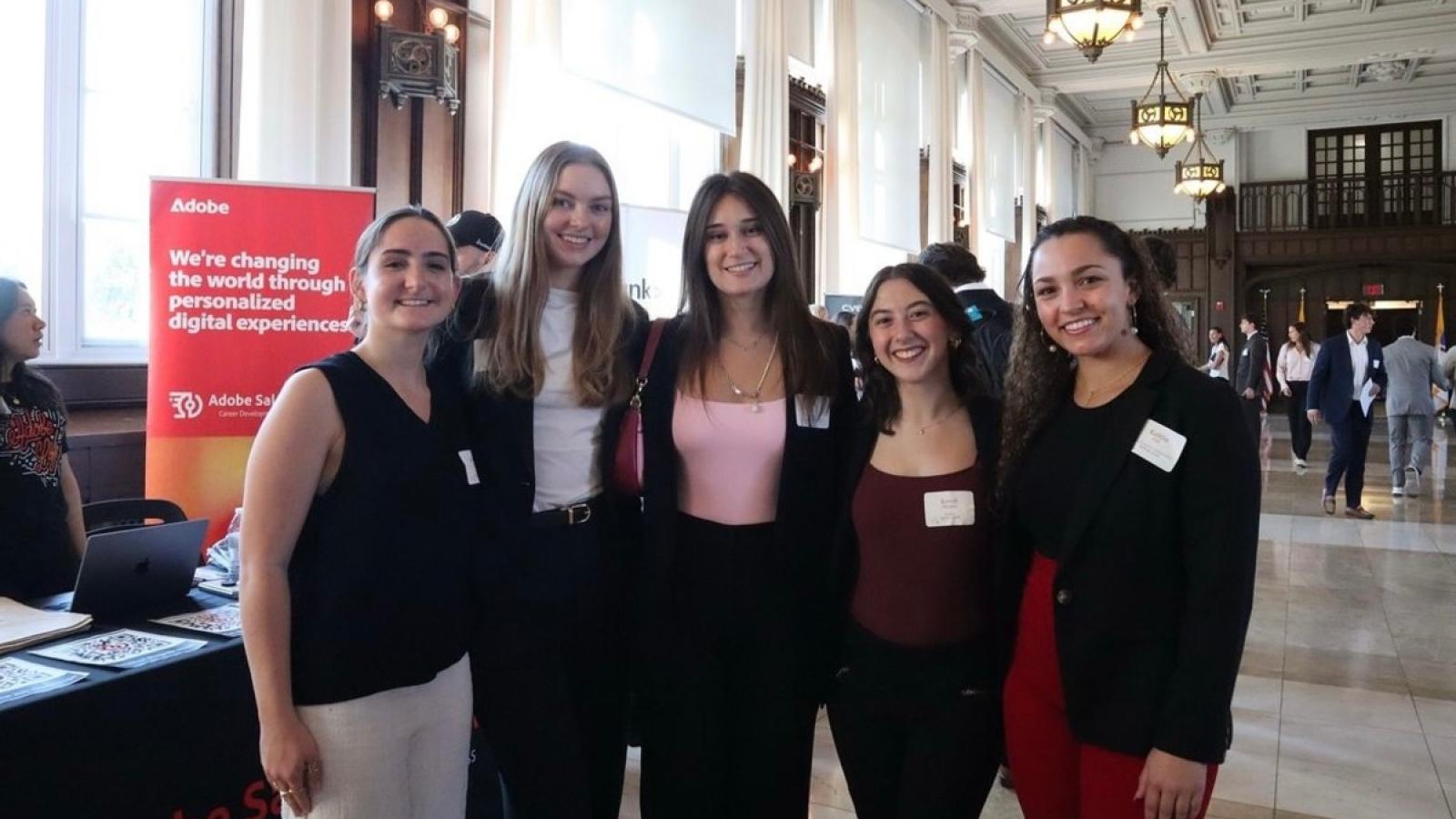 kelsey and other business students at a busch school event