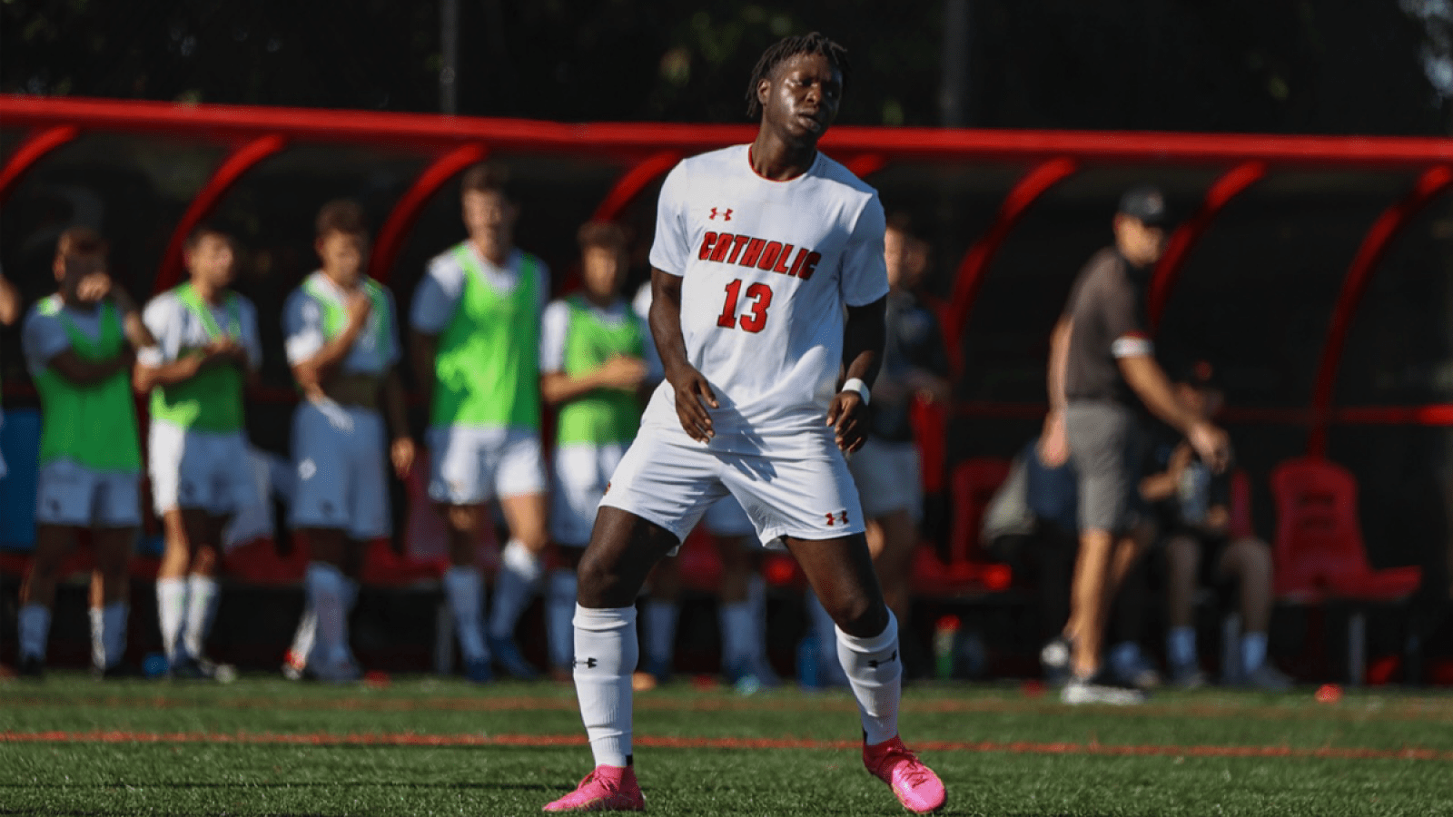 kwaku playing on the CUA soccer team