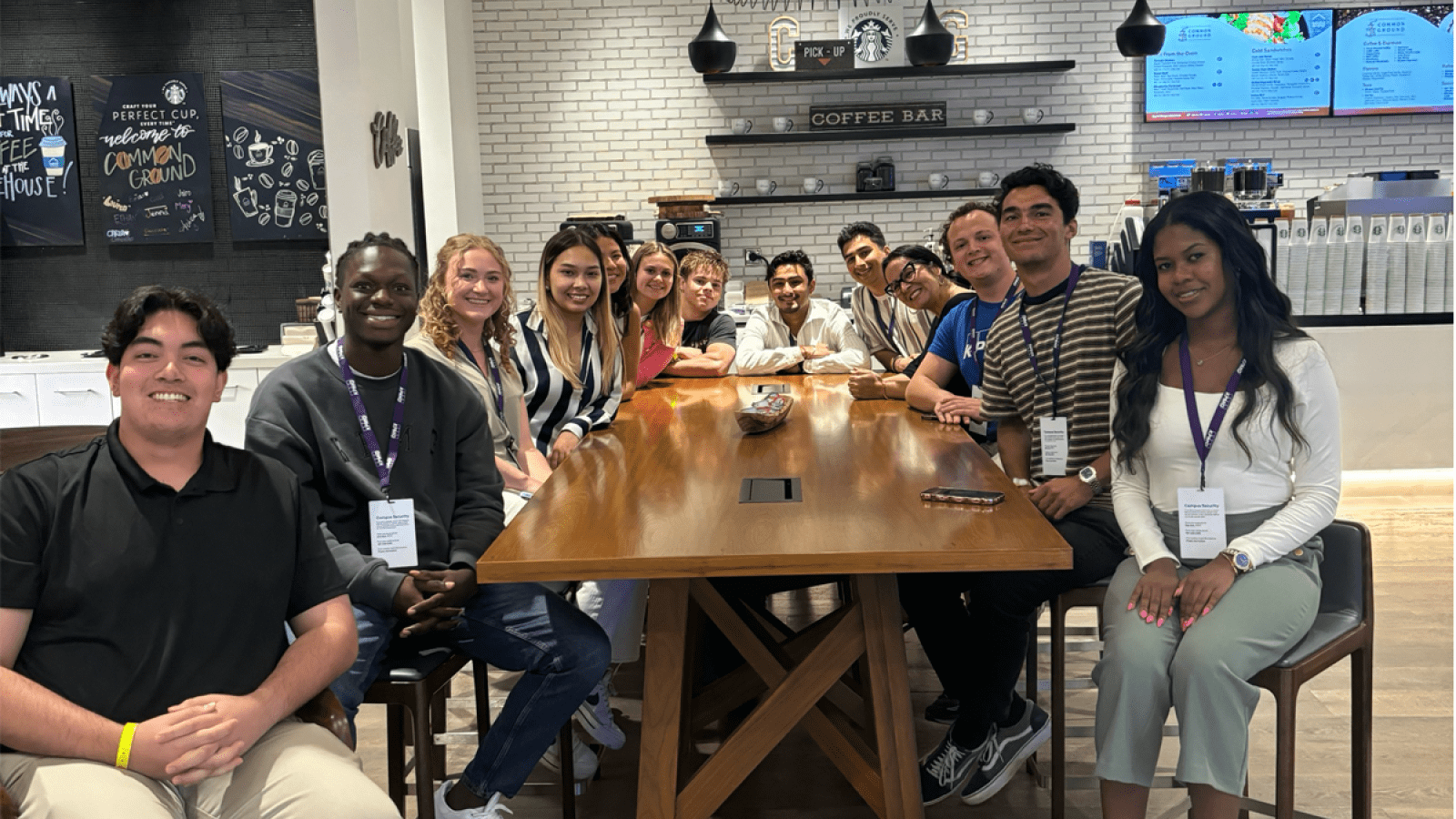 kwaku at a coffee shop with friends/coworkers