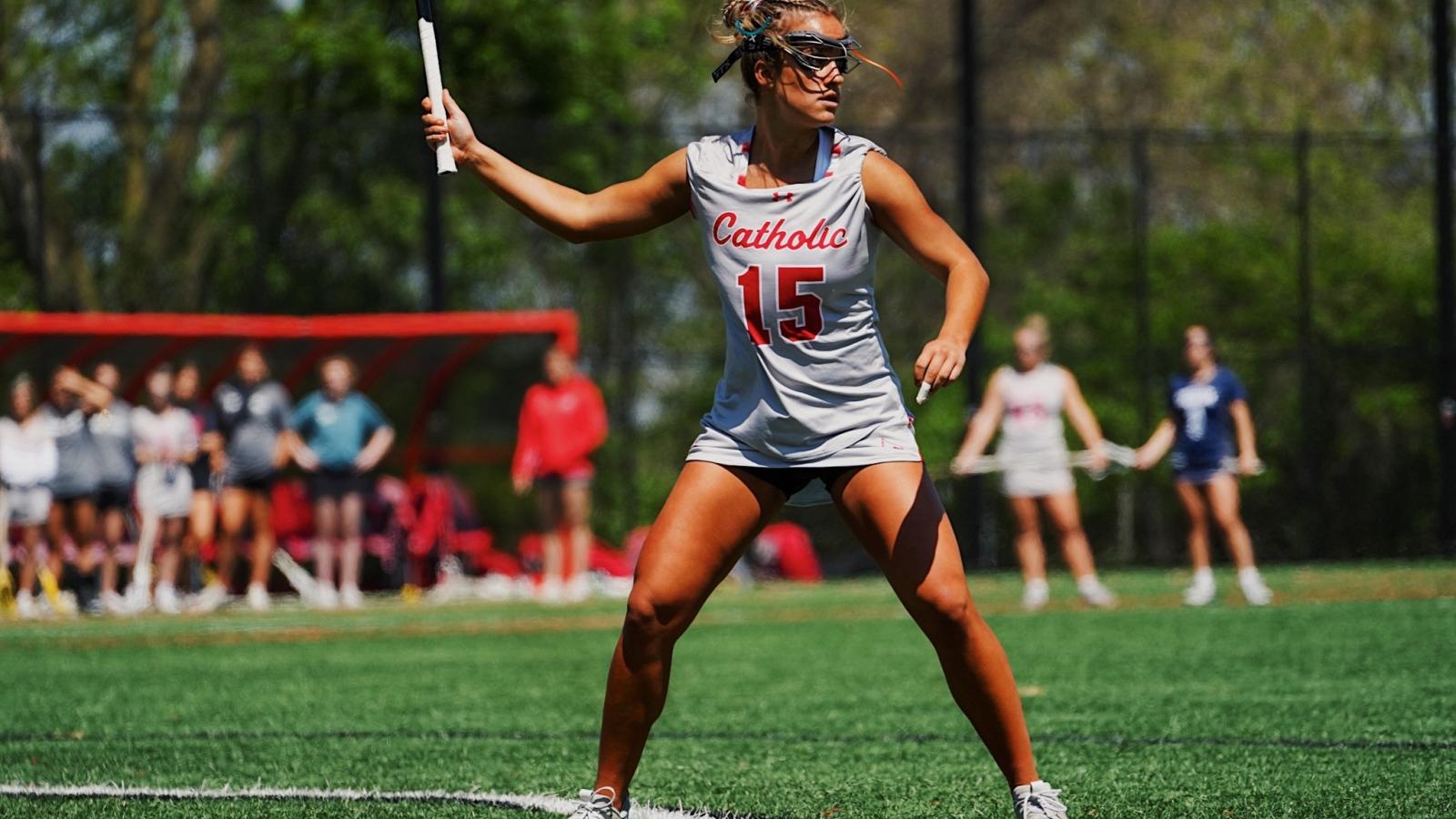 lauren playing lacrosse on the CUA women's team