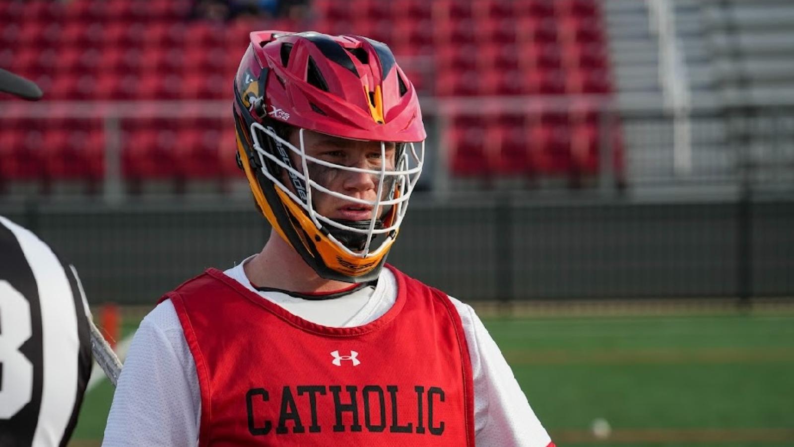 liam playing on the cua lacrosse team