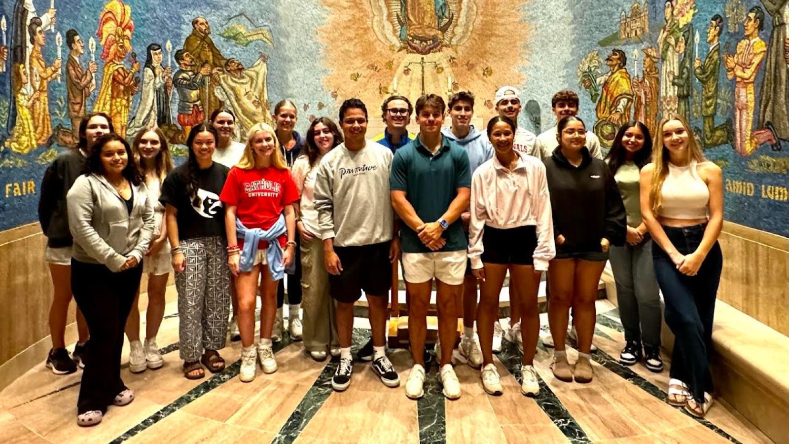 mp with other students inside a chapel dedicated to Our Lady of Guadalupe