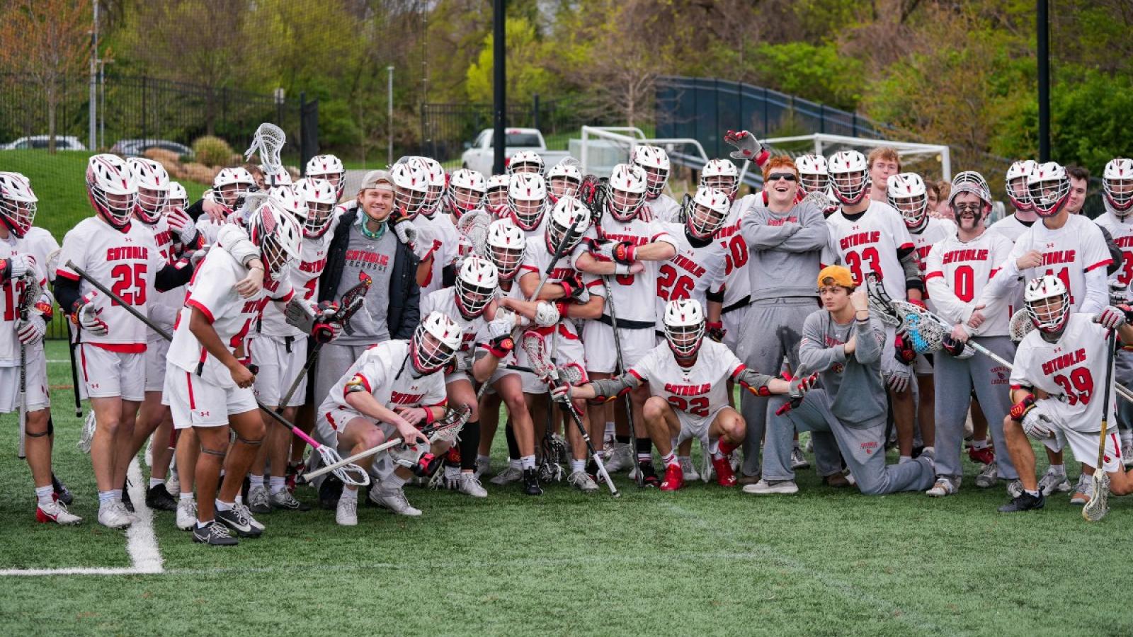 mason and the cua men's lacrosse team