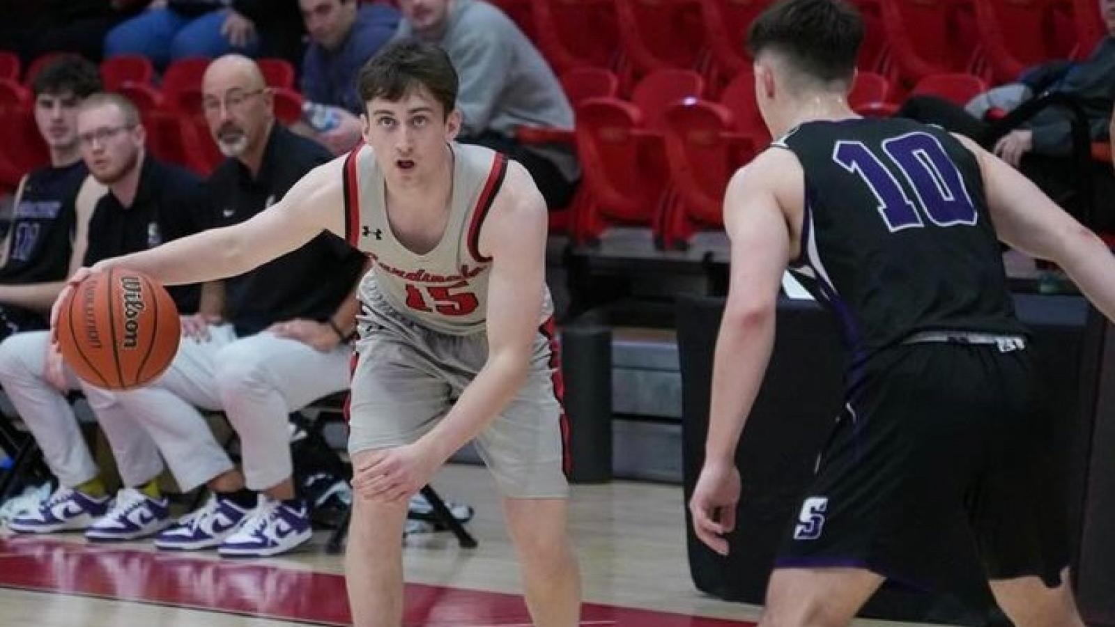 owen playing on CUA's basketball team