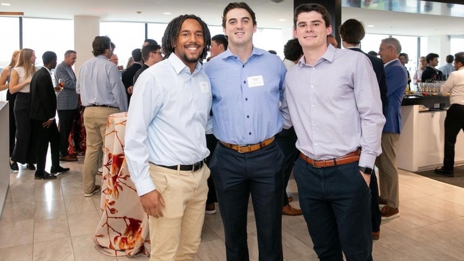 ryan and some friends at a business school social