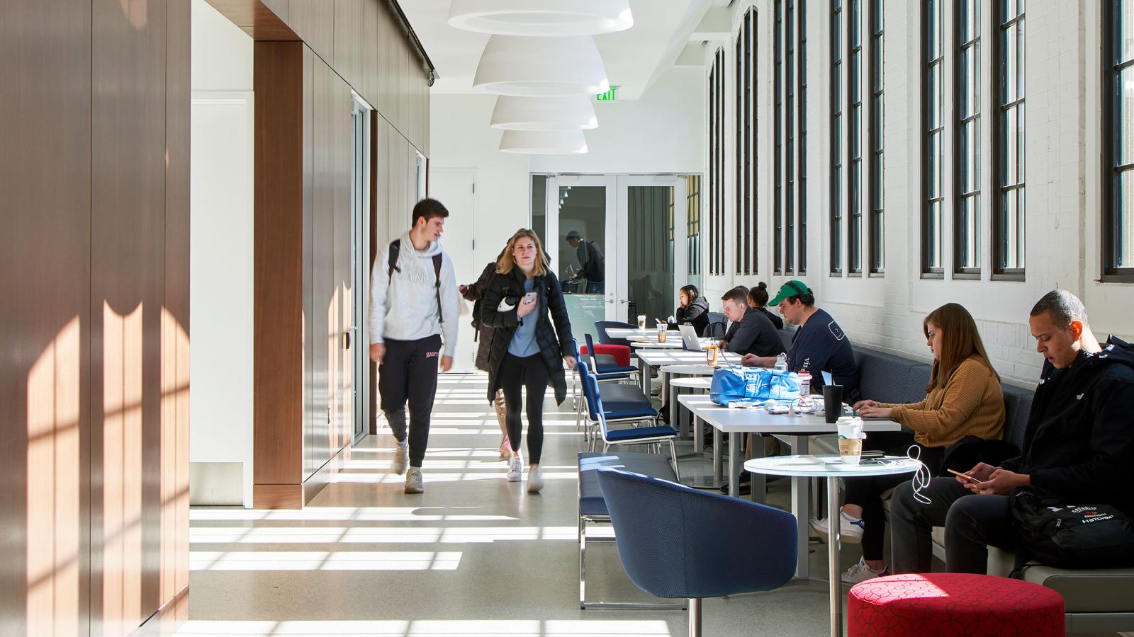 Students studying in Maloney Hallway.