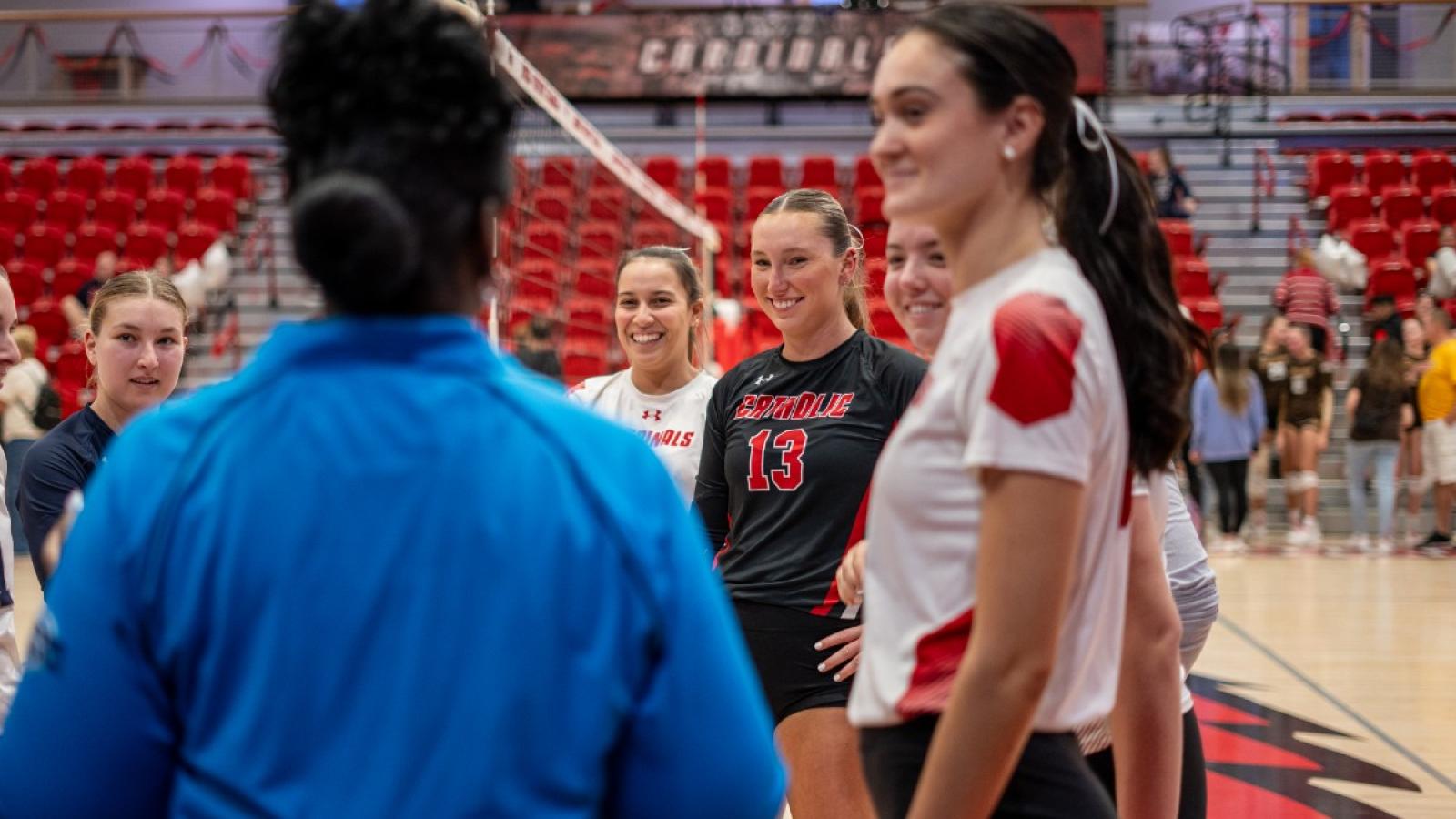brynne playing volleyball for CUA