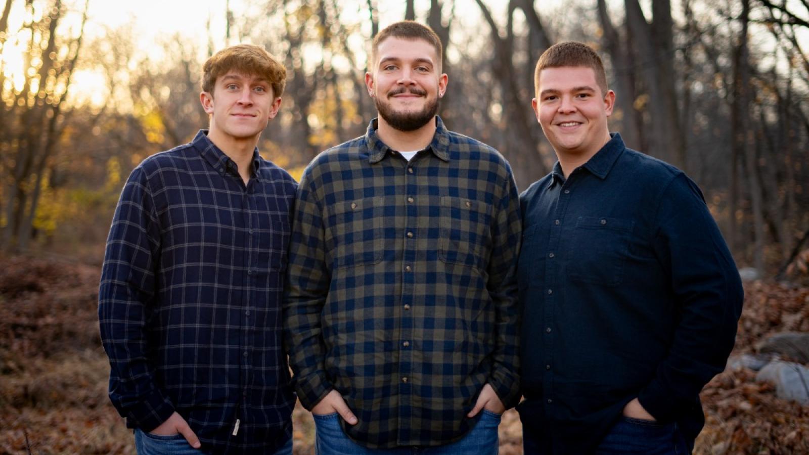 cameron and his friends outside in the fall
