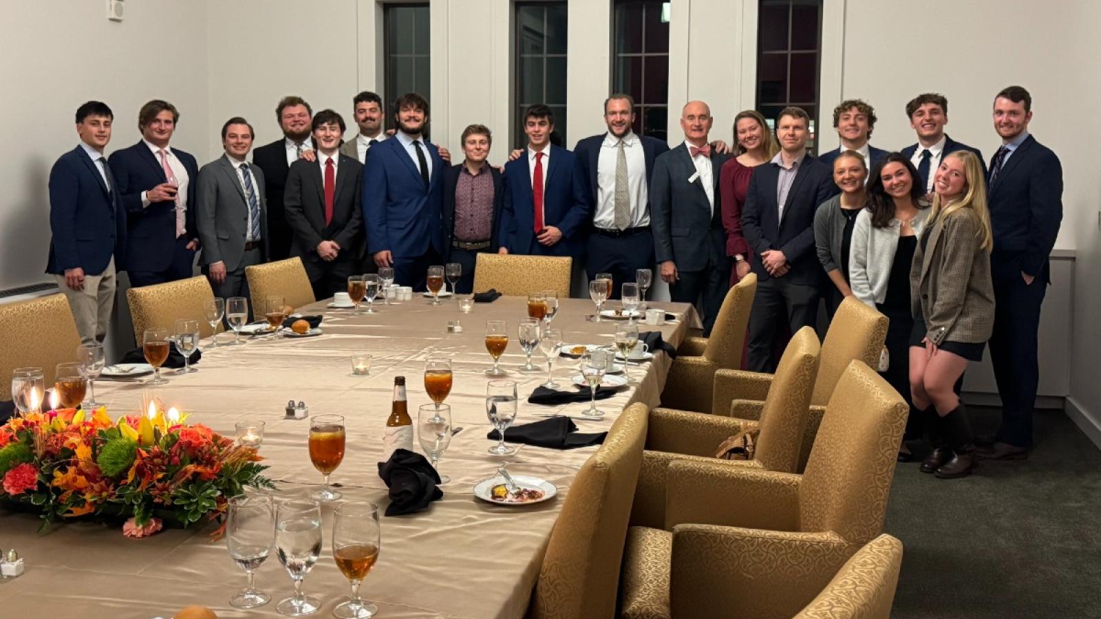 cameron and his classmates at a fancy dinner