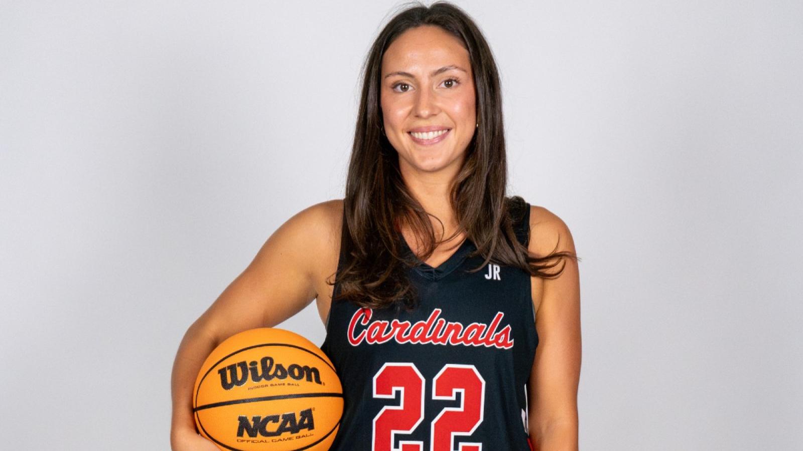 carly in her basketball uniform