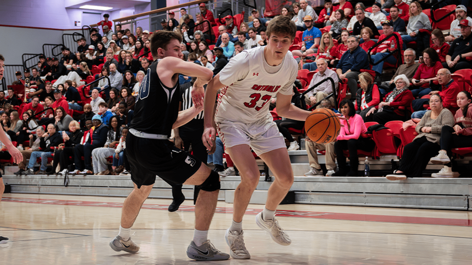 charley playing basketball for CUA