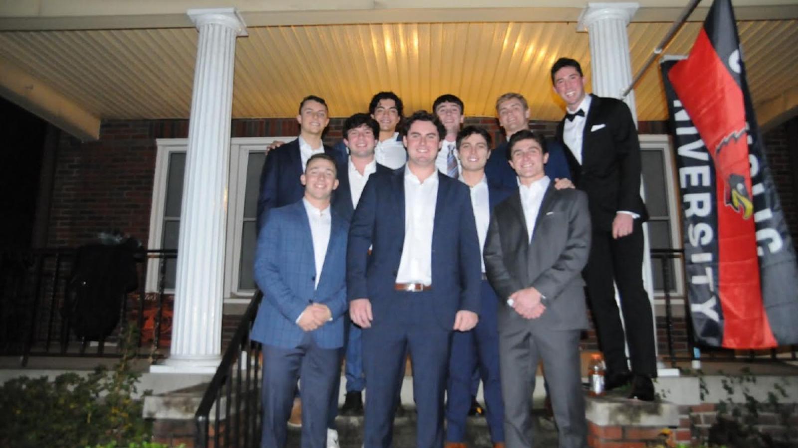 giuseppe and CUA friends dressed in business attire