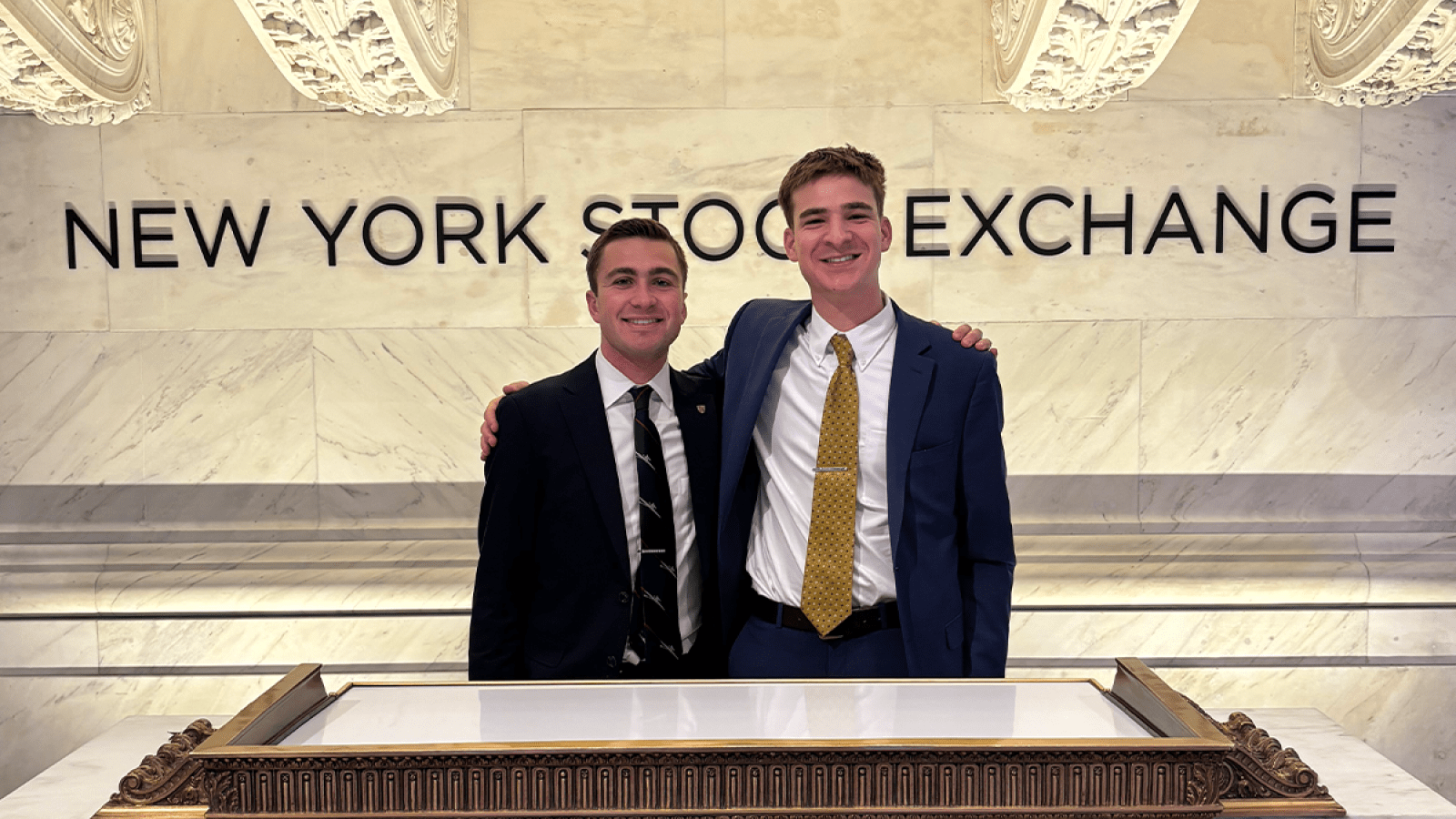matthew and a friend at the new york stock exchange