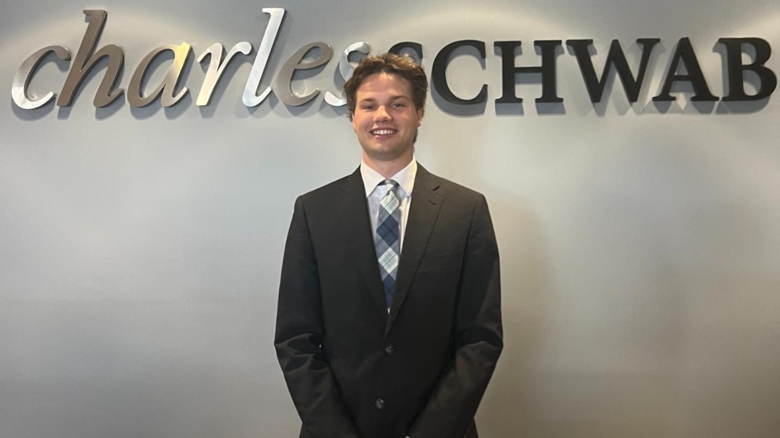 ben in a suit at charles schwab