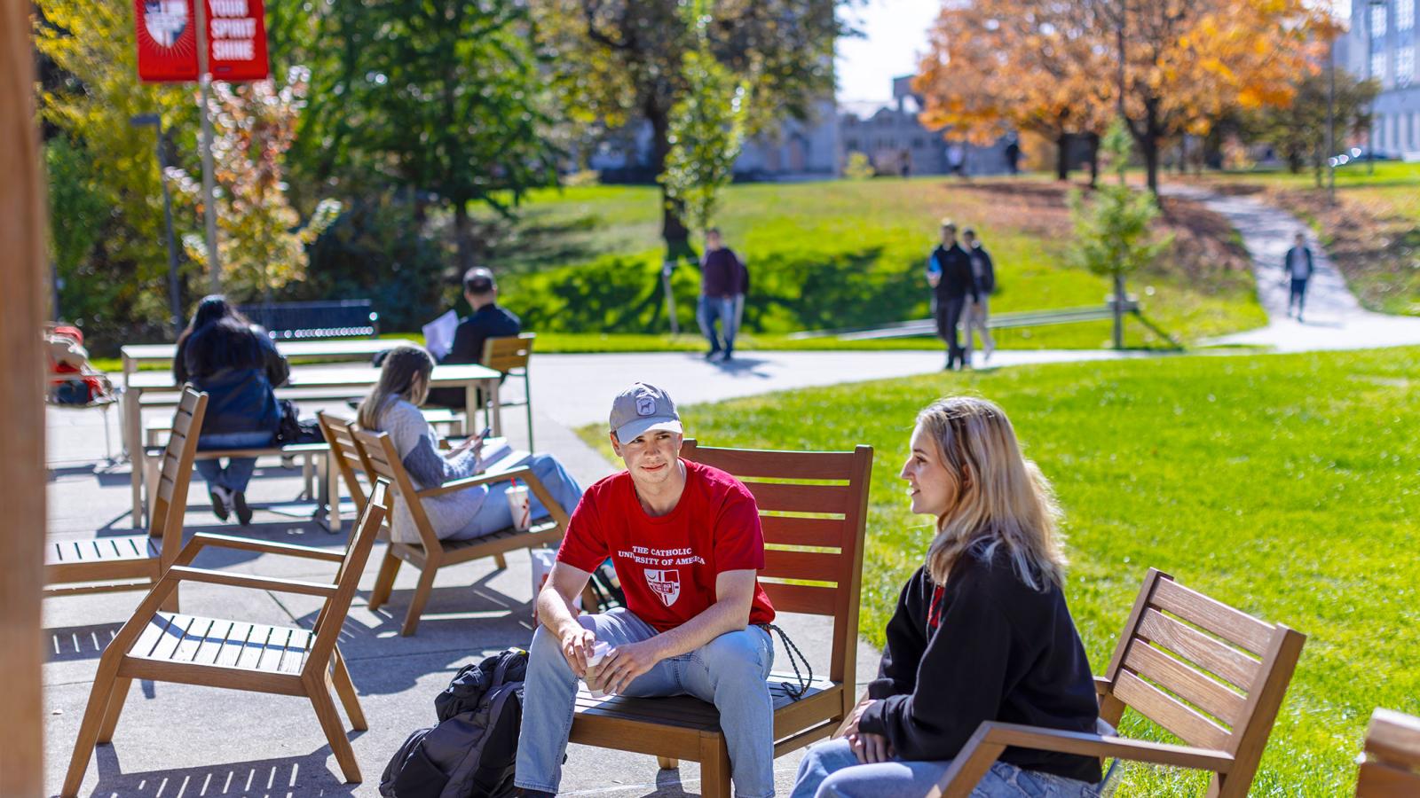 Students enjoying the campus greenspace.