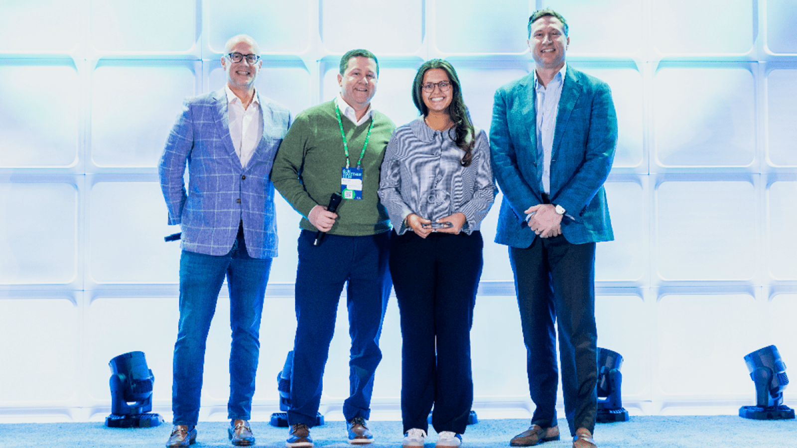 devon being presented an award at qlik