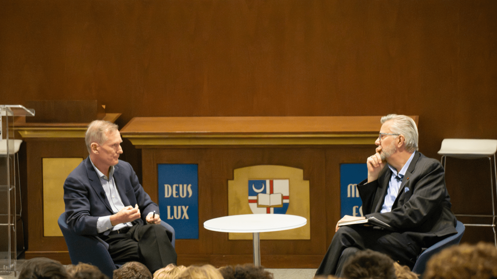 Brian Hamilton speaking with Busch faculty member during his talk. 