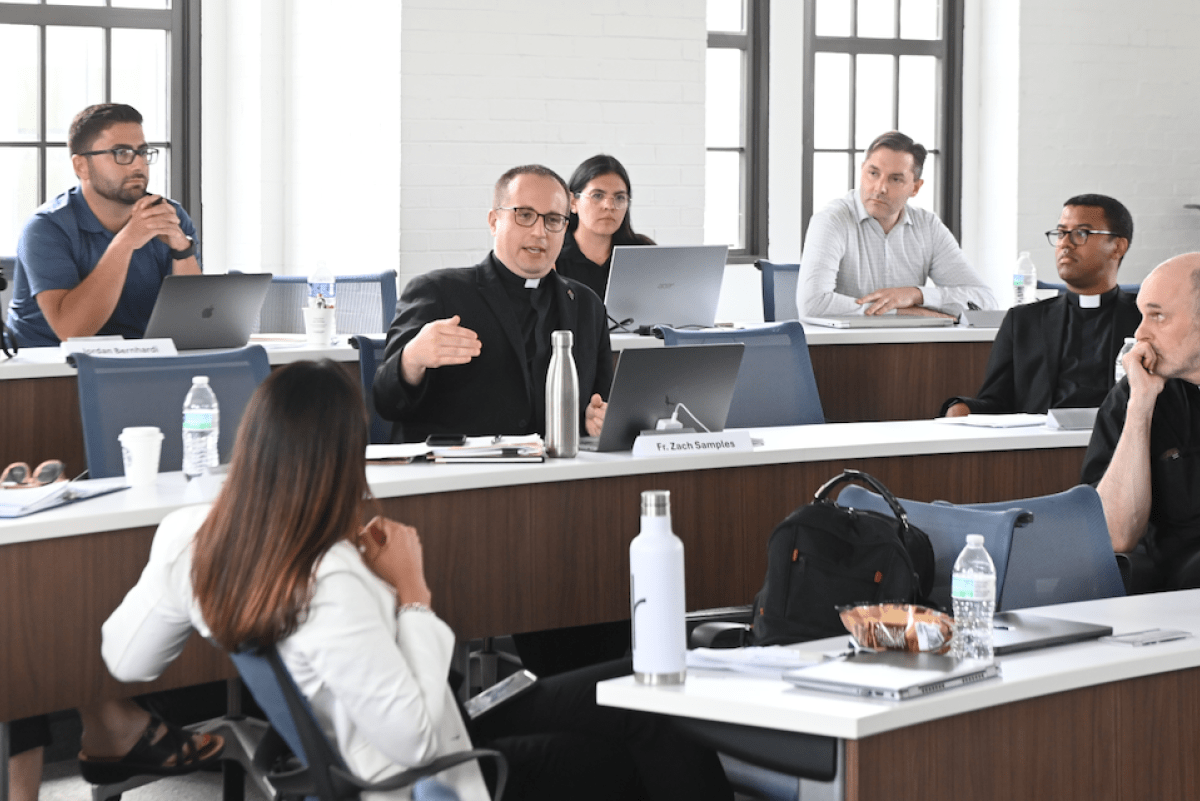 executives of the church in a class setting