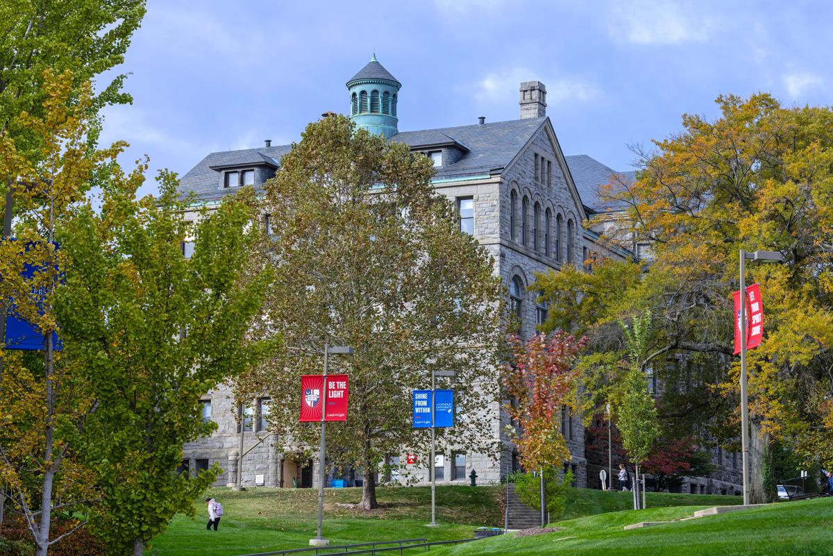 Catholic University central lawns and buildings on campus.