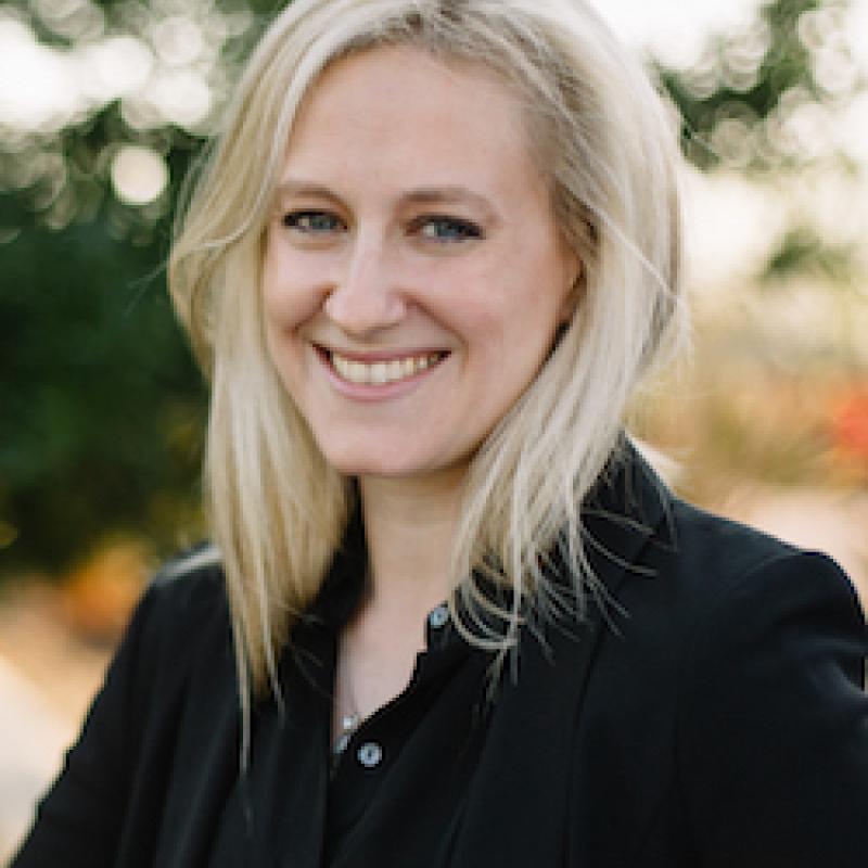 Photo of Catherine Ruth Pakaluk. She has long, blonde hair and is wearing a black shirt and blazer.