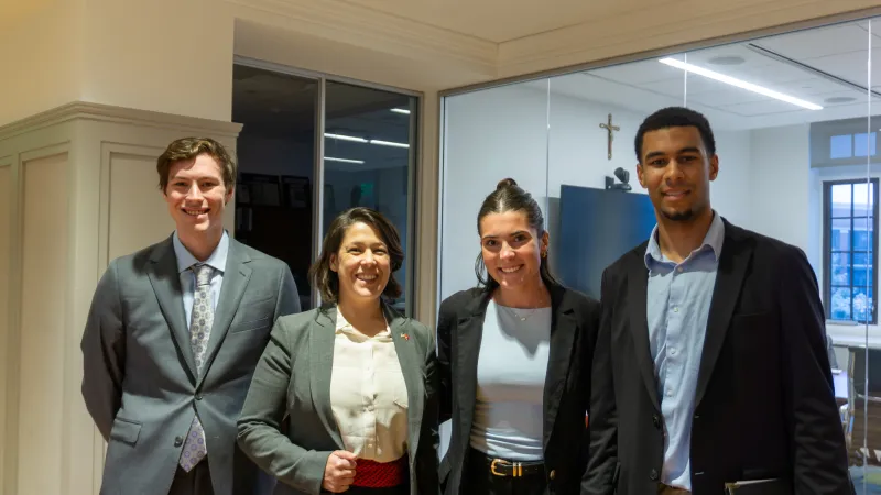 MBA students pitch simulated companies to investors, using real data and strategy to compete in a fast-paced business simulation.