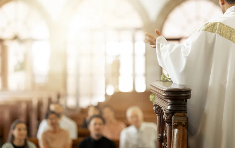 pastor leading church
