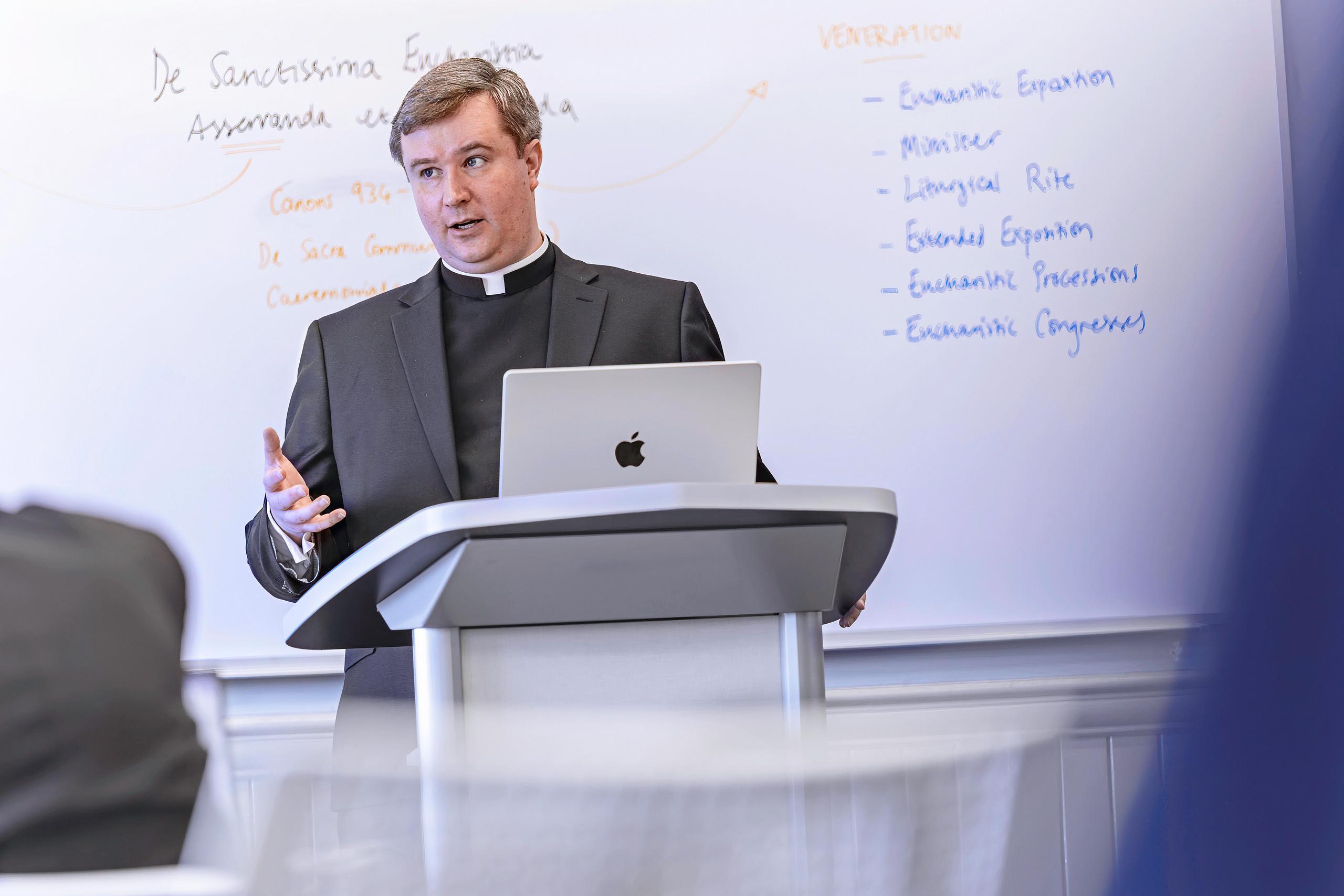 catholic pastor teaching
