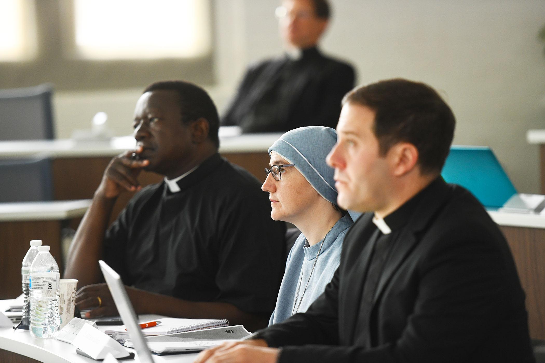 Clergy attending class together.